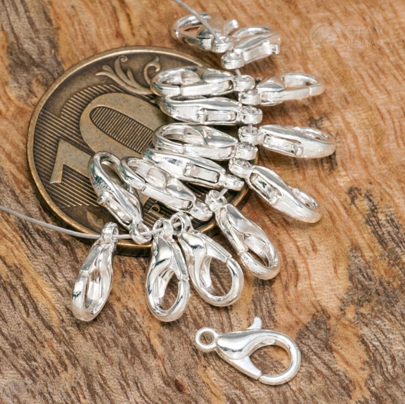 Миниатюрная застёжка-лобстер цвета серебра из ювелирного сплава, длиной 10 мм, отверстие 1.5 мм, вес 0.22 г - прочная для бижутерии.