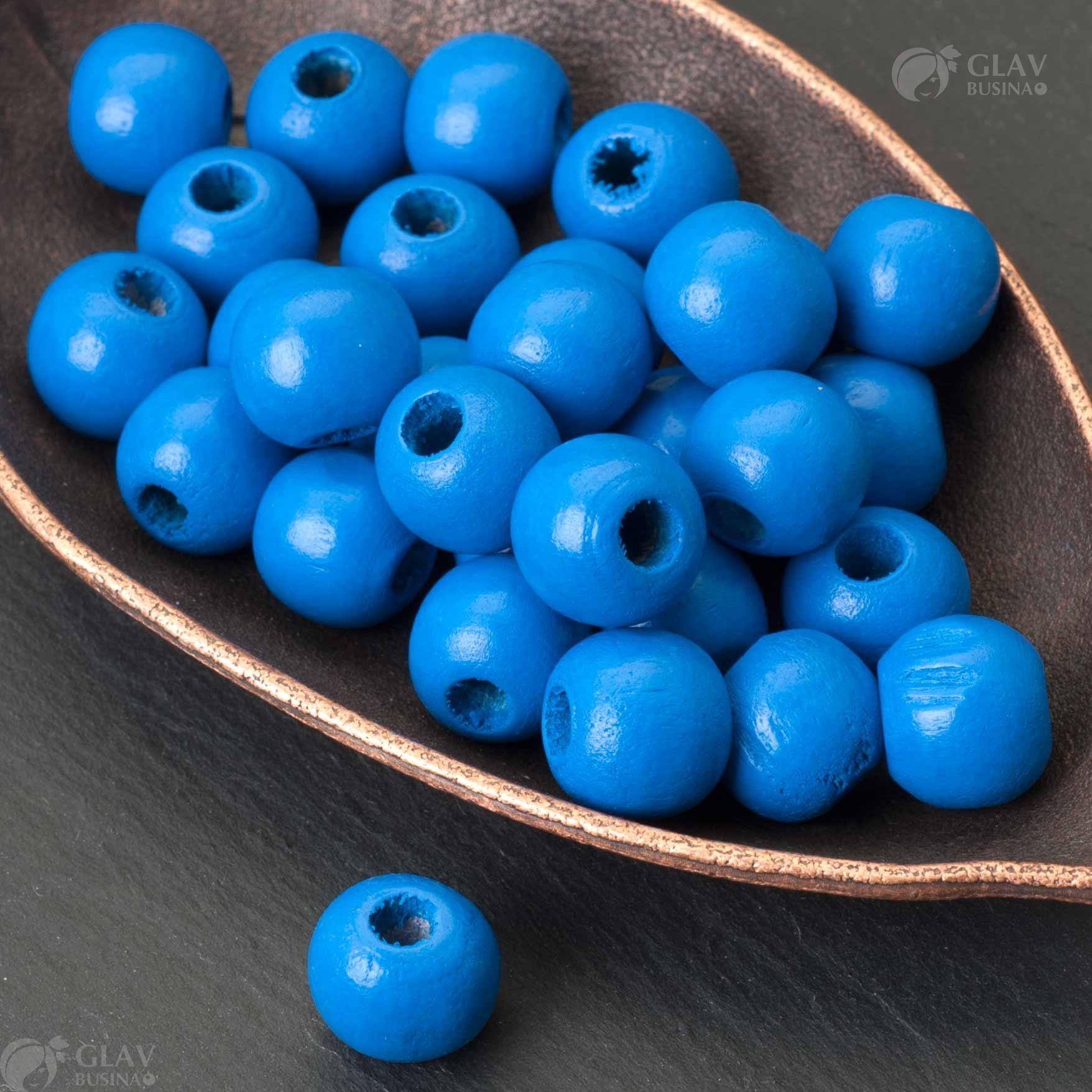 Синие деревянные бусины размером 12х11мм с отверстием 4мм, идеальны для украшений и рукоделия.