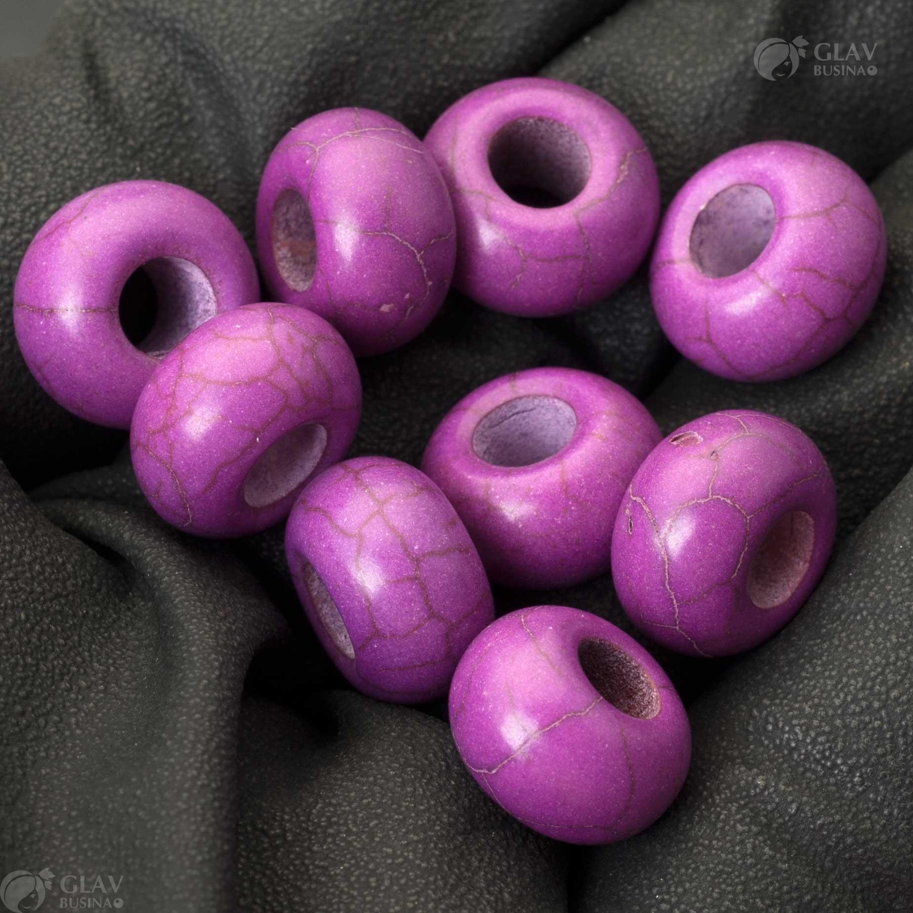 Фиолетовые бусины-бублики из синтетического говлита, размером 14x8мм с отверстием 5мм, идеальны для изготовления украшений.